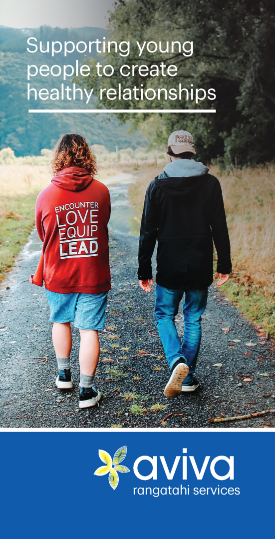 two teens walk along a park path on the front of Aviva's Rangatahi brochure
